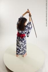 Japanese Woman Poses With Sword Saori